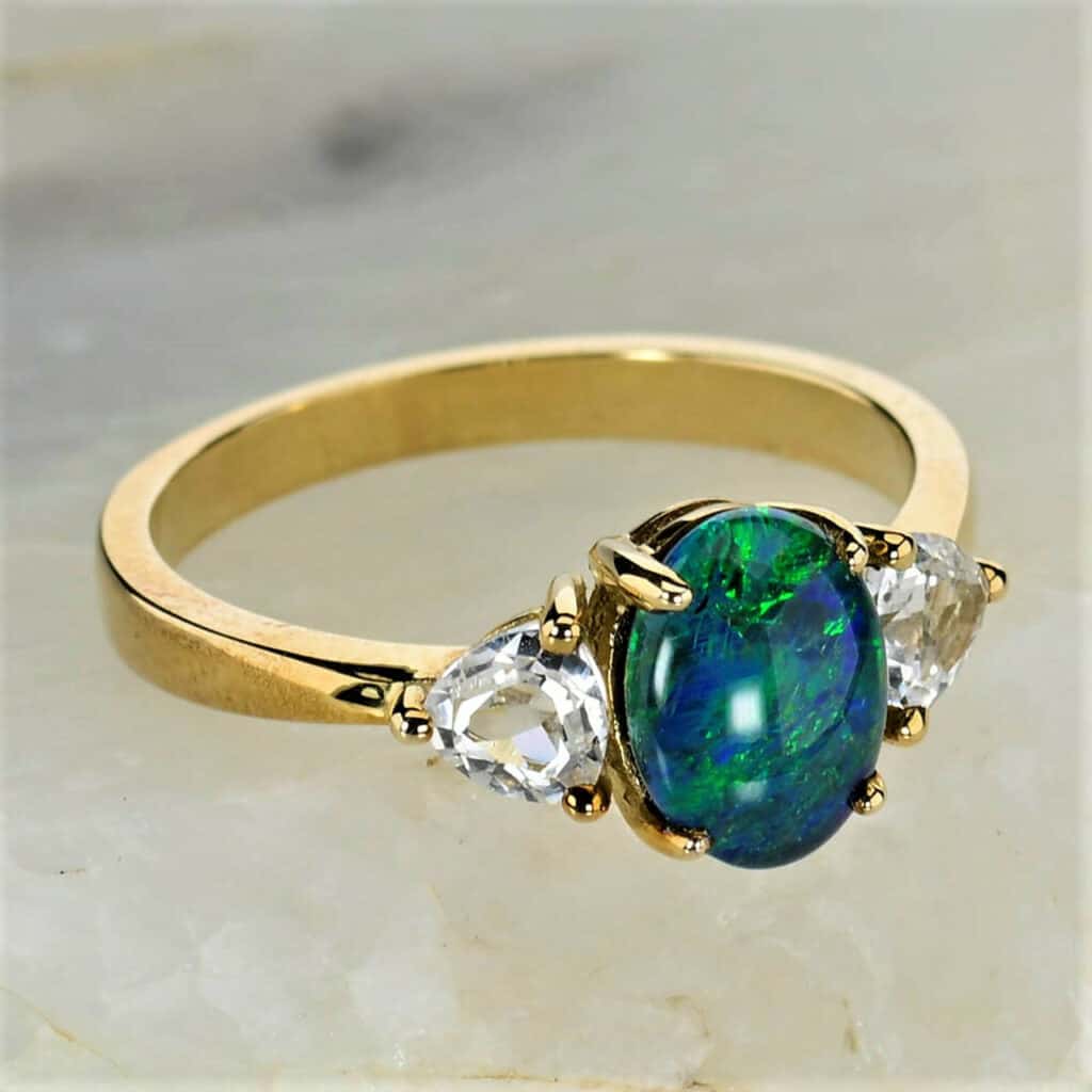 yellow gold topaz opal ring